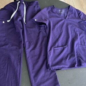 Figs size S top, Small Tall Bottom, purple jam color, great condition.